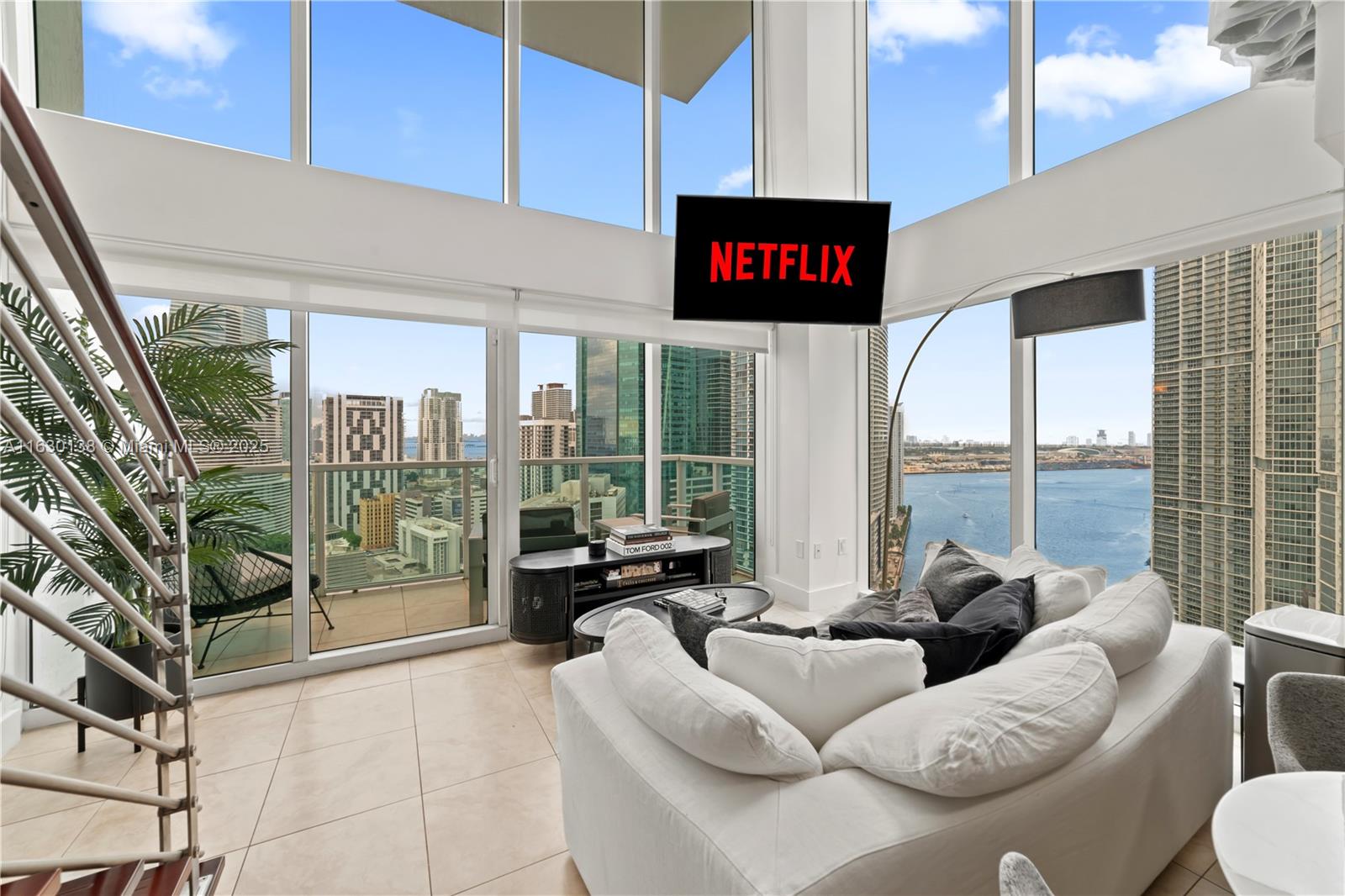 REDUCED-PRICED TO SELL! Coveted Brickell on the River located in the heart of Downtown Miami/Brickell! Steps to Brickell City Center, the finest shopping, dining, & entertainment venues that Miami has to offer, providing an exceptional & convenient lifestyle. The best & highest 01 Line for sale! Building has no assessments and no litigation. Investor friendly. 2-Story Corner Unit offered turnkey furnished styled by renowned Dimension NY! Luxury loft-style 2-bed, 2-bath, 2 interior levels, expansive floor-to-ceiling windows allowing an abundance of natural light, & 2 balconies offering captivating views of Miami River, Bay and city skyline. Top-tier amenities: cutting-edge fitness center, swimming pool, spa, sauna, 24-hr concierge, business center, club room, valet parking. New W/D in unit.