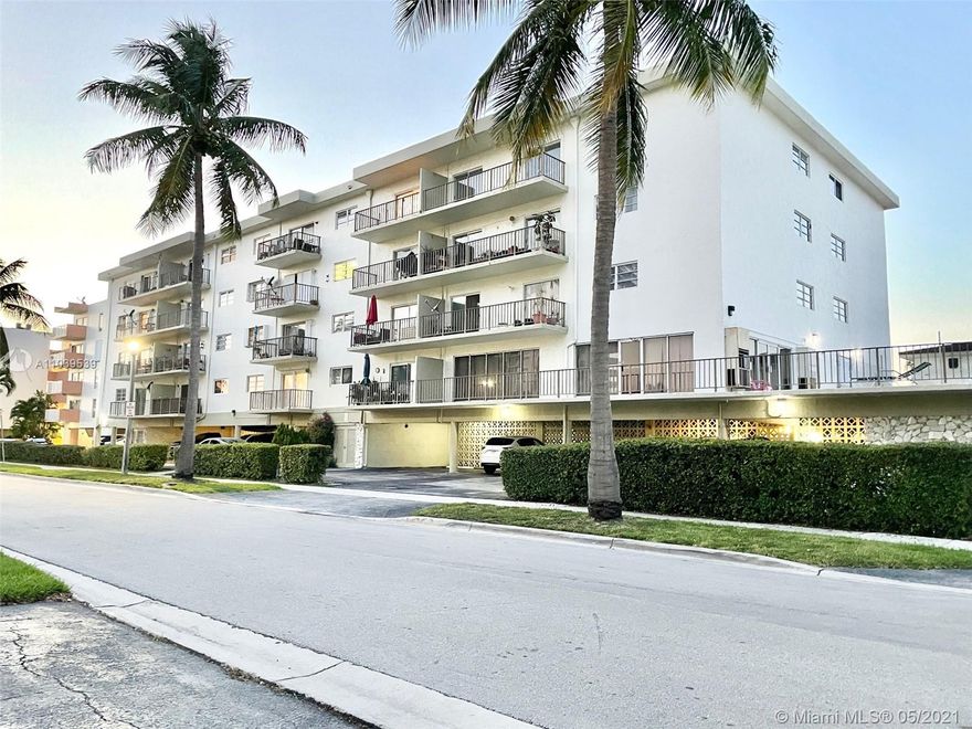 Very Desirable Corner Unit with no neighbors on either side. Unit features wood like ceramic tile throughout, Samsung stainless steel appliances, and open concept living/kitchen & dinning. There's 2 sets of sliding doors to the long balcony which allows a lot of sunlight into the living space.  Every window has partial views of the canal and the beautiful sunny isles skyline. This unit is the largest model in the building and also has a large master bedroom and updated baths. Storage unit right next door and laundry room on same floor. There is an assigned covered parking space plus a decent amount of guest parking if there's a second vehicle.  Eastern shores is unique police gated community walking distant to the supermarket, Ipic, shops & dinning.