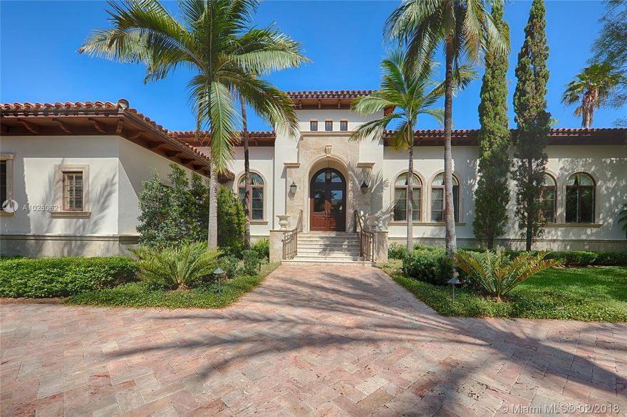 Stunning Mediterranean gem designed by Ramon Pacheco on gated beautifully landscaped 36,750 sf lot. Circular driveway,grand front entrance w/arched mahogany doors.Foyer,formal living & dining rm have high ceilings. Elegant custom finishes throughout:mahogany millwork, Roatan wood drs,built-ins,marble & wood flrs.The spacious kitchen has Sub Zero/Wolf appliances, large island,walk-in pantry. Breakfast area opens to family rm overlooking garden,pool area & covered terrace. Large sitting rm opening to master suite on a split level w/2 generous walk-ins, elegant new bathroom & private covered terr.Bedrooms wing has 3 addl en-suites.The pool deck & large yard feature a covered summer kitchen,built-in bar,full cabana bath.Separate staff quarters.SqFt is ADJ area as per owner.