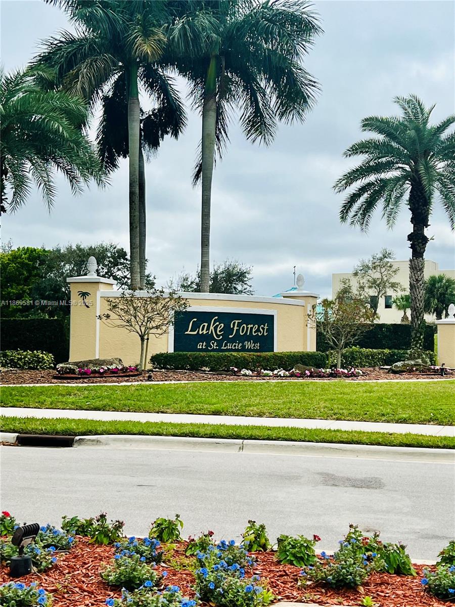 Welcome to the beautiful gated community of Lake Forest at St Lucie West. This fabulous 3 way split bedroom plan home is move in ready. Many special features include sitting room in Master suite, eat in kitchen and a full length covered patio that backs up to a private berm. New two inch horizontal blinds throughout. Offered at an affordable price to live in this spectacular development with acres of preserves, upland trails and lakes. The many amenities include 2 pools, exercise facility, clubhouse, picnic area and playground. You can make this your new home before the end of the​​‌​​​​‌​‌​​​‌‌​​​‌‌‌​​‌​​‌‌​​​​ year!