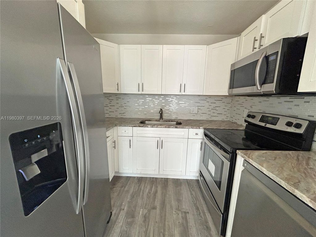 Photo of 5884 S 38th St #5884, Green Acres, FL 33463 (MLS # A11980397)