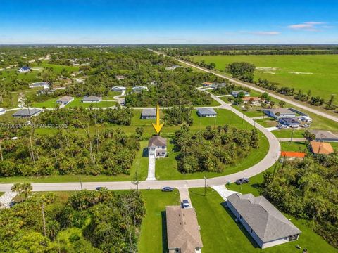 Photo of 3036 Harvard Circle, La Belle, FL 33935 (MLS # A11993871)