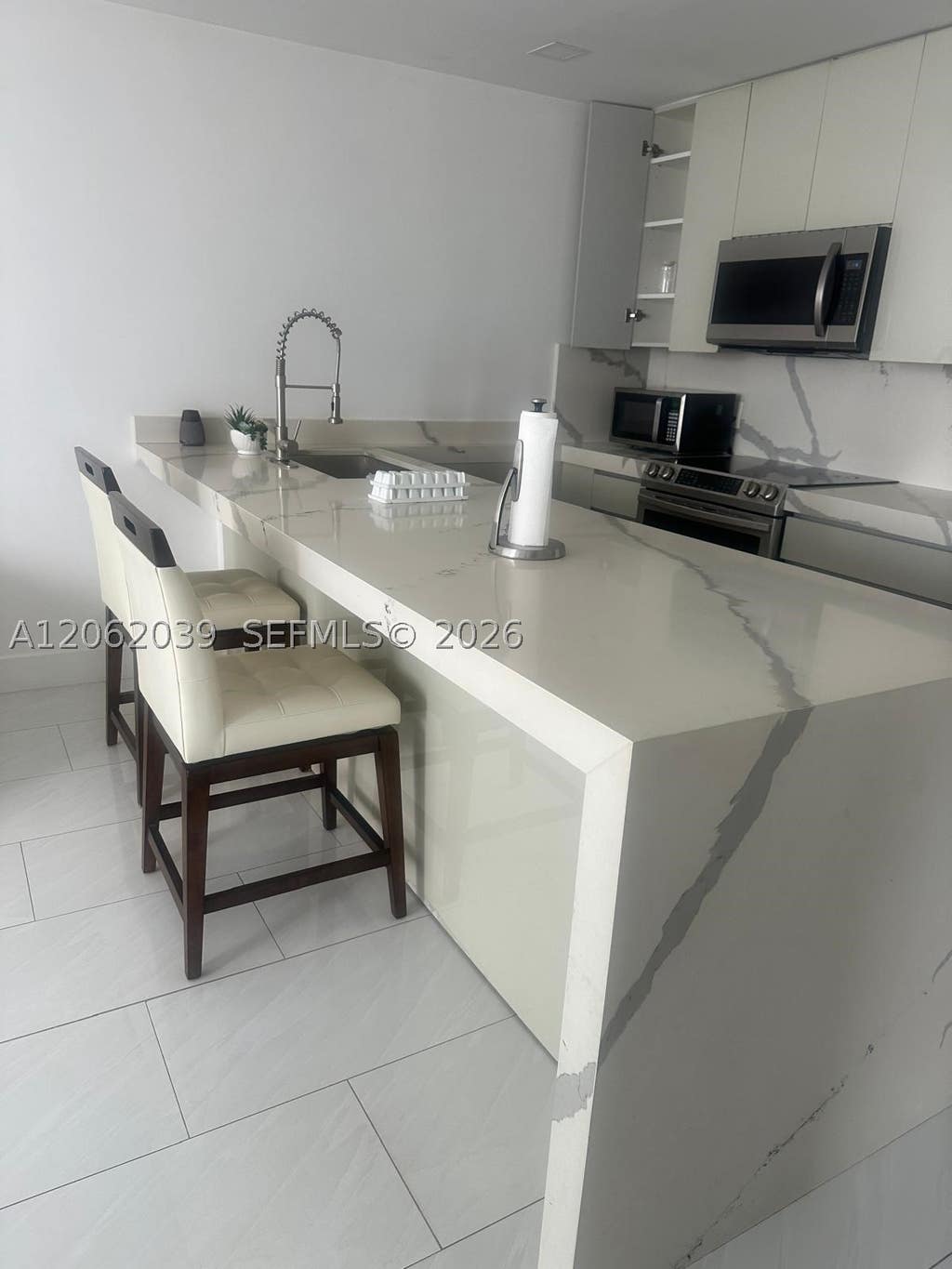 Photo of 3725 S Ocean Dr #1507, Hollywood, FL 33019 (MLS # A12062039)