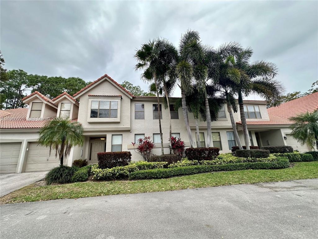 Photo of 5790 Coach House Cir #E, Boca Raton, FL 33486 (MLS # A11960925)