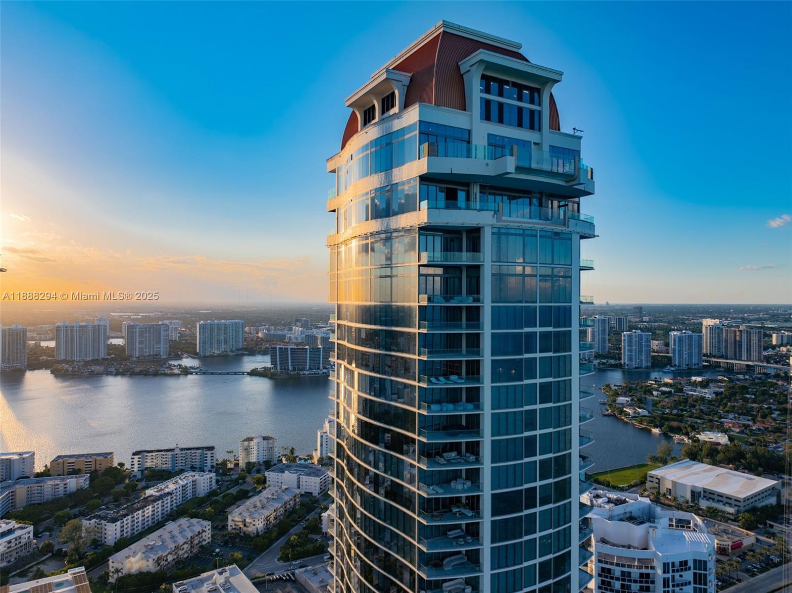 Experience the pinnacle of oceanfront luxury living at The Estates at Acqualina. Perched on the 46th floor, this expansive residence offers unobstructed views of the Atlantic Ocean and Miami skyline. The chef’s kitchen is equipped with Wolf and Sub-Zero appliances, while the terrace with summer kitchen is ideal for entertaining. The lavish primary suite offers dual baths and custom walk-in closets, complemented by floor-to-ceiling windows framing endless vistas. Residents enjoy over 45,000 SF of world-class amenities, including a spa, ice-skating rink, bowling alley, resort-style pools, fine dining, and a private beach club — all within Sunny Isles’ most prestigious oceanfront address.