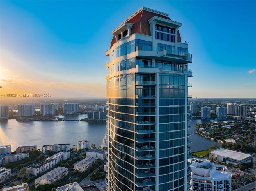 Experience the pinnacle of oceanfront luxury living at The Estates at Acqualina. Perched on the 46th floor, this expansive residence offers unobstructed views of the Atlantic Ocean and Miami skyline. The chef’s kitchen is equipped with Wolf and Sub-Zero appliances, while the terrace with summer kitchen is ideal for entertaining. The lavish primary suite offers dual baths and custom walk-in closets, complemented by floor-to-ceiling windows framing endless vistas. Residents enjoy over 45,000 SF of world-class amenities, including a spa, ice-skating rink, bowling alley, resort-style pools, fine dining, and a private beach club — all within Sunny Isles’ most prestigious oceanfront address.