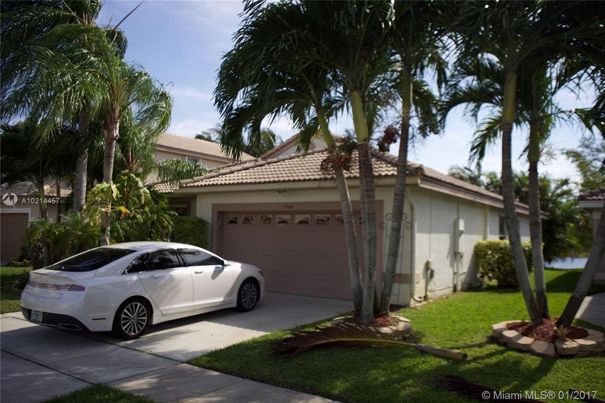 SPACIOUS HOME IN SILVER LAKES  NEIGHBORHOOD. THIS ONE-STORY HOME HAS 3 BEDROOMS 2 BATHROOMS & 2 CAR GARAGE. VERY LARGE HIGH CEILING MSTR SUITE WITH SEPARATE MARBLE BATHROOM & SHOWER. THREE  BEDROOMS  WITH PARQUET FLOORING. LARGE UPGRADED KITCHEN W/GRANITE COUNTERTOPS, NATURAL WOOD CABINETS, ISLAND/BAR & SS APPL. ONE RANGE- E AND ONE STOVE FOR COOKING. SPACIOUS LIVING & DINING AREAS. OUTSIDE TERRACE IN FRONT OF A PRIVATE CANAL. ROOM FOR POOL.