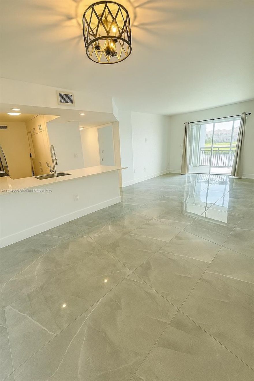 Beautifully remodeled condo offering modern style and comfort in one of Cutler Bay’s most desirable communities. This spacious 2-bedroom, 2-bath residence features upgraded floors throughout and a contemporary kitchen complete with quartz countertops and stainless steel appliances. Enjoy breathtaking lake views from not one, but two private balconies, perfect for morning coffee or relaxing evenings. The open-concept layout fills the space with natural light, creating a bright and welcoming atmosphere. Located in a well-maintained community, residents enjoy access to resort-style amenities including a sparkling pool, fitness center, and clubhouse. Conveniently situated near shopping, dining, parks, and major highways, this condo offers both tranquility and accessibility.