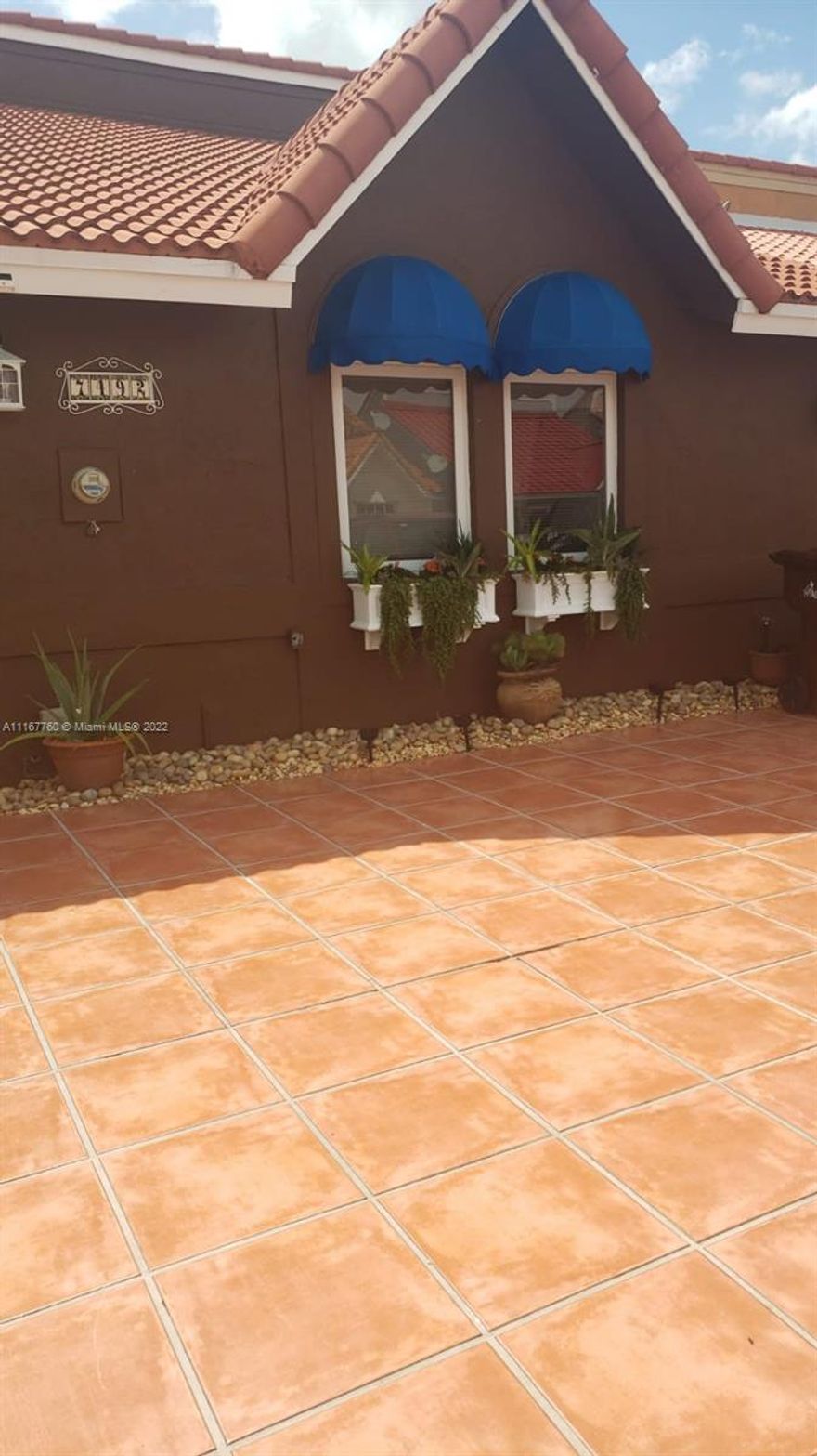 LOVELY WELL MAINTAINED HOME IN HIALEAH CENTRALLY LOCATED WITH A ROOF ONLY 2 YEARS NEW. STAINLESS STEEL APPLIANCES WITH CORIAN COUNTERTOPS.  HOME BOASTS IMPACT GLASS.
NO HOA. BEAUTIFUL TERRACE FOR ENTERTAINING.