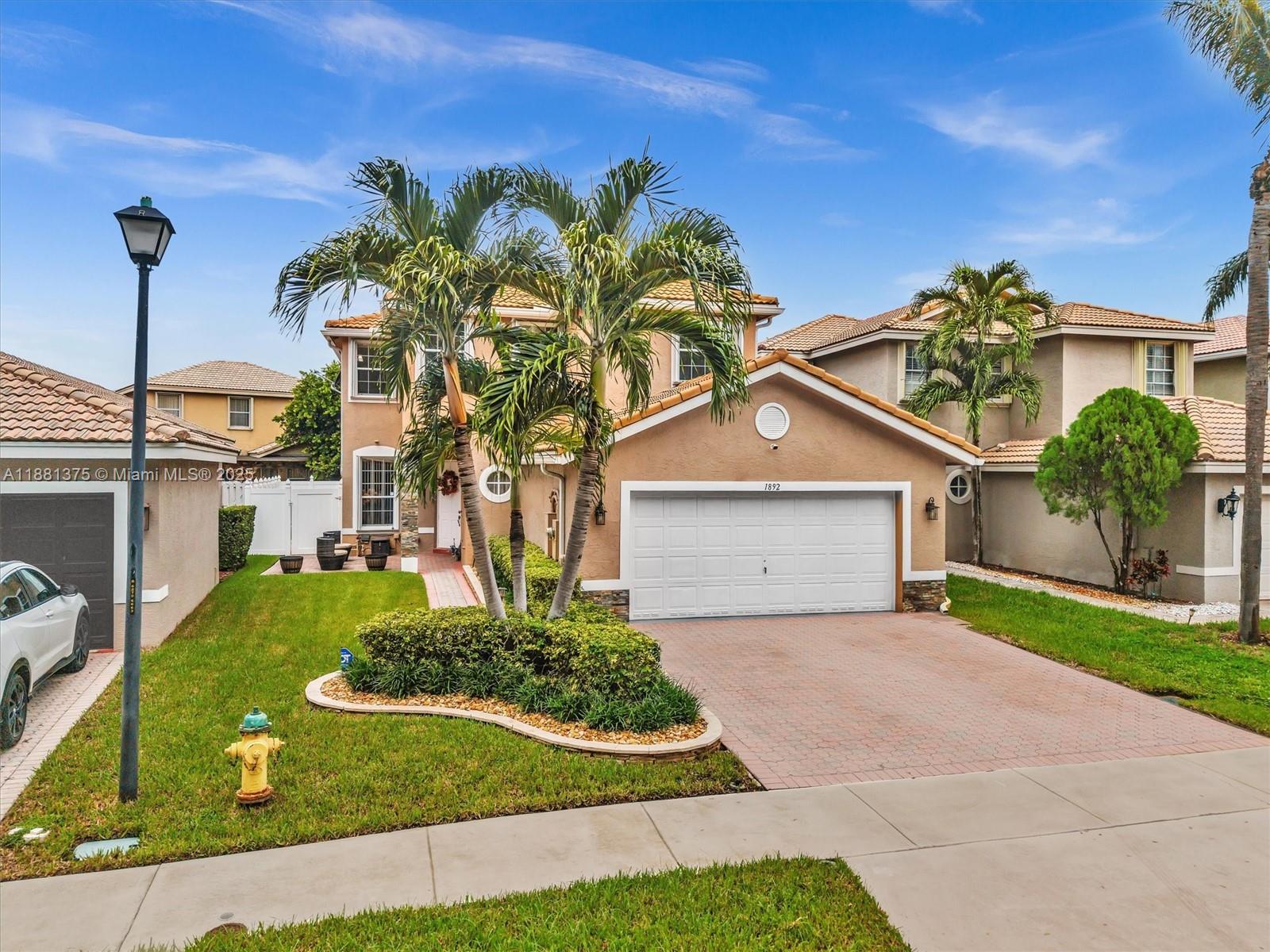 Welcome to this inviting 5-bedroom, 3-bathroom home in the gated Silver Shores community. The main floor includes a comfortable bedroom and full bath, ideal for guests or family. The spacious kitchen offers a large island, granite countertops, and ample pantry space, opening to a cozy living room with an electric fireplace.
This home is designed with peace of mind in mind, featuring accordion shutters, impact doors, ADT-monitored security cameras, and a permitted propane generator. Beautiful rock landscaping enhances the curb appeal.
Step outside to the aluminum terrace with blackout shades—perfect for relaxing or entertaining. Residents of Silver Shores also enjoy wonderful community amenities, making this home a great blend of comfort, security, and lifestyle.