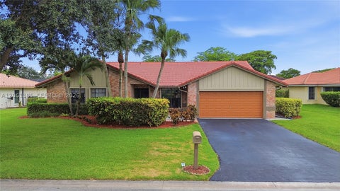 Photo of 866 NW 110th Ave, Coral Springs, FL 33071 (MLS # A12061385)