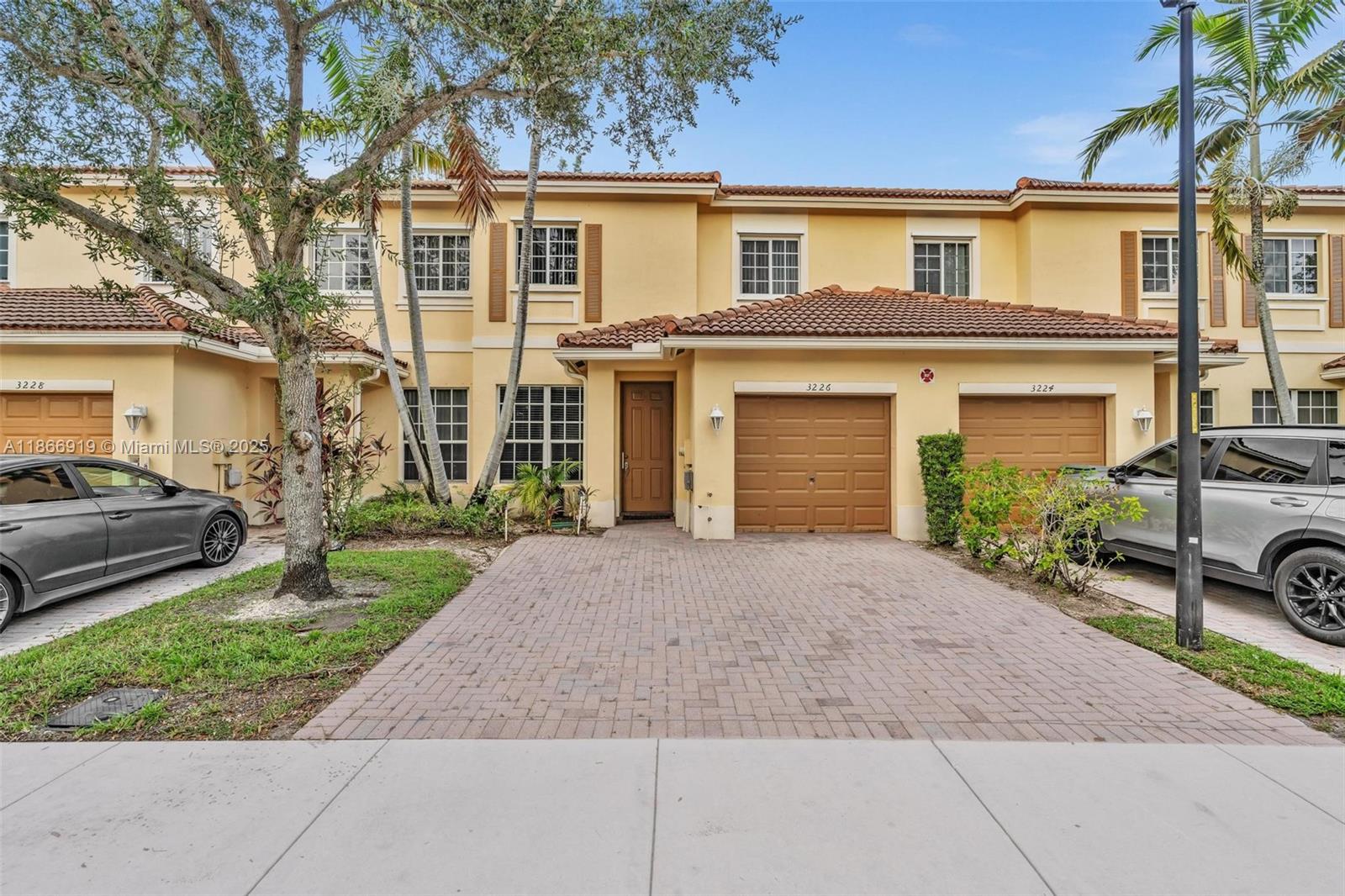 Welcome to your new home in the highly sought-after, gated community of Isles at Oakland Park. This stunning 3-bedroom, 2.5-bathroom townhouse is move-in ready and features a beautifully updated kitchen with solid wood cabinets, and stainless steel appliances. Enjoy the modern aesthetic with brand-new vinyl wood flooring and tile throughout. The spacious living area and convenient walk-in laundry room provide both comfort and functionality. With a one-car attached garage and a low monthly HOA fee that includes access to a community pool, this home offers a blend of luxury and convenience. The community is Pet-friendly and allows for immediate rentals, making it a perfect opportunity for investors or homeowners.
