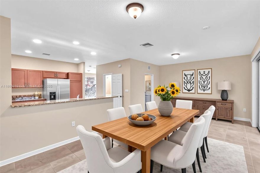 PRICE JUST REDUCED!  Welcome to your new home in the highly sought-after, gated community of Isles at Oakland Park. This stunning 3-bedroom, 2.5-bathroom townhouse is move-in ready and features a beautifully updated kitchen with solid wood cabinets, and stainless steel appliances. Enjoy the modern aesthetic with brand-new vinyl wood flooring and tile throughout. The spacious living area and convenient walk-in laundry room provide both comfort and functionality. With a one-car attached garage and a low monthly HOA fee that includes access to a community pool, this home offers a blend of luxury and convenience. The community is Pet-friendly and allows for immediate rentals, making it a perfect opportunity for investors or homeowners.