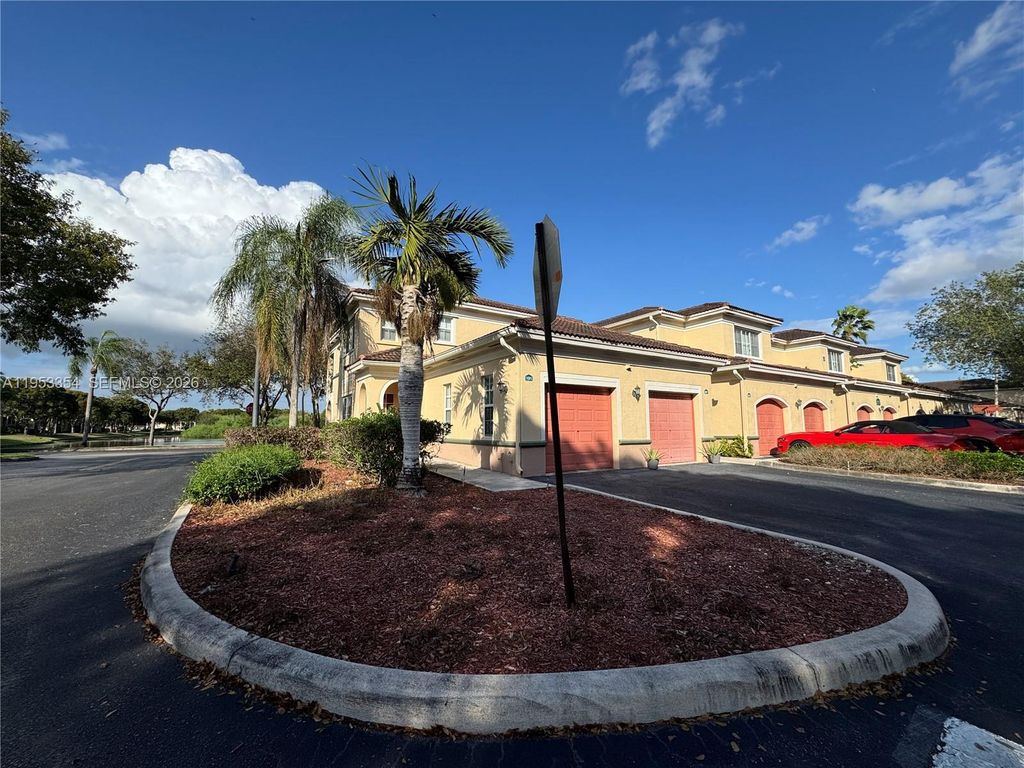 Photo of 2557 Centergate Dr #101, Miramar, FL 33025 (MLS # A11953354)