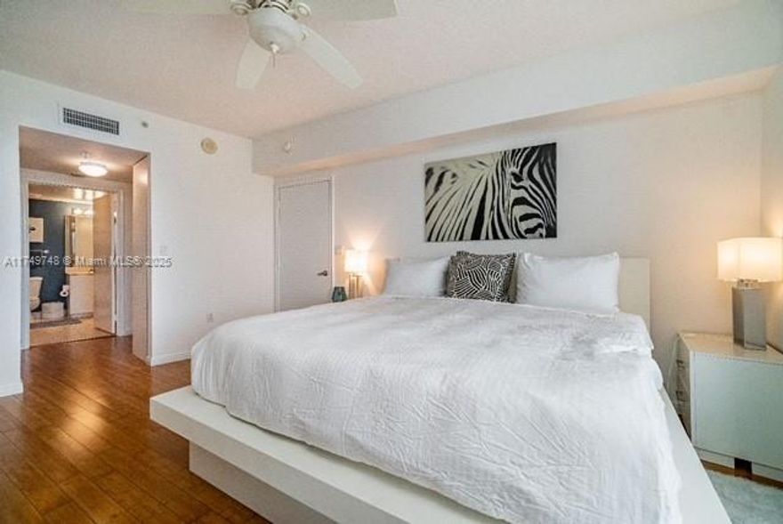 Fully-furnished penthouse unit with great potential for high returns. A prompt closing and a cash investment are required to take advantage of this opportunity. This lavishone-bedroom, one-bath penthouse condo at Opera Towers offers an unparalleled living experience and features stunning views. The unit, in high demand for rentals, boasts impeccably maintained bamboo wood floors, cherrywood European kitchen cabinets, and black Galaxy marble countertops. This condo has excellent rental potential, allowing for rental every 30 days up to 12 times a year. Unit rented for $3200 until July 31, 2025