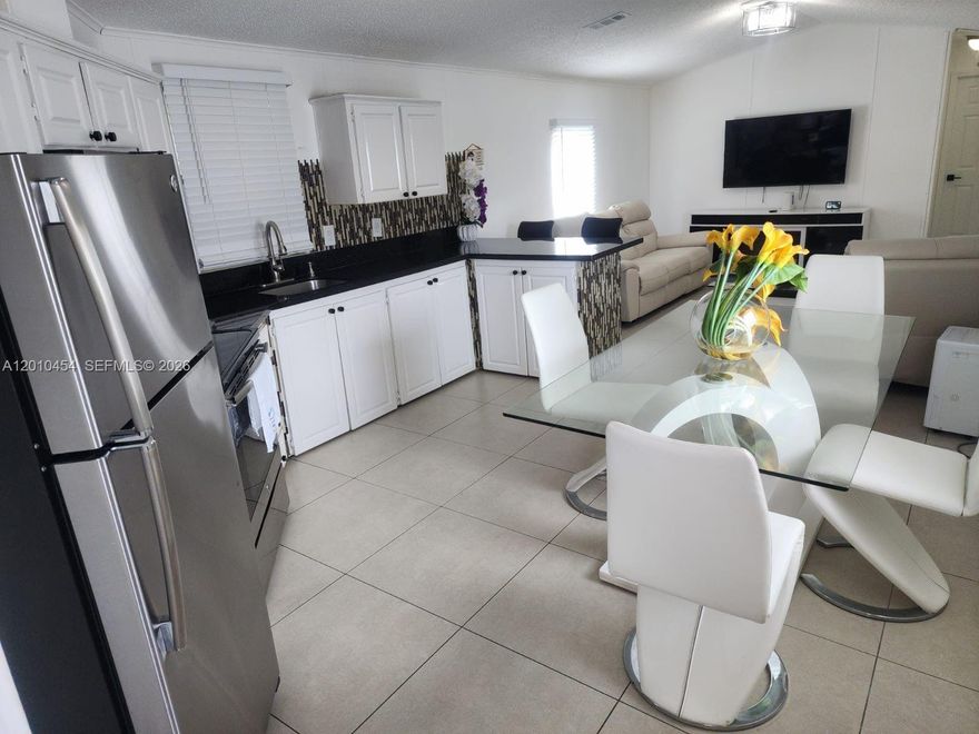 Beautifully updated 2 beds / 2 Baths  mobile home offering comfort, style, and convenience. Land not included. This well-maintained property features a bright and open floor plan with spacious living and dining areas, perfect for everyday living and entertaining. The home has been recently upgraded with modern finishes, including updated flooring, refreshed kitchen cabinetry, and stylish fixtures throughout.
The kitchen offers ample counter space and storage, ideal for cooking and hosting. Bedrooms are generously sized with plenty of natural light, while the bathroom(s) have been tastefully renovated for a clean, contemporary feel.
Enjoy outdoor living with a private yard/patio area, perfect for relaxing or gatherings. Located in a well-kept community with easy access to major highways, shopping, dining, and schools.
Move-in ready and priced to sell—this is a great opportunity for homeowners or investors alike. Parking space fits 4 cars. Mobile home living area 780 SqFt. Lot size 6000 SqFt