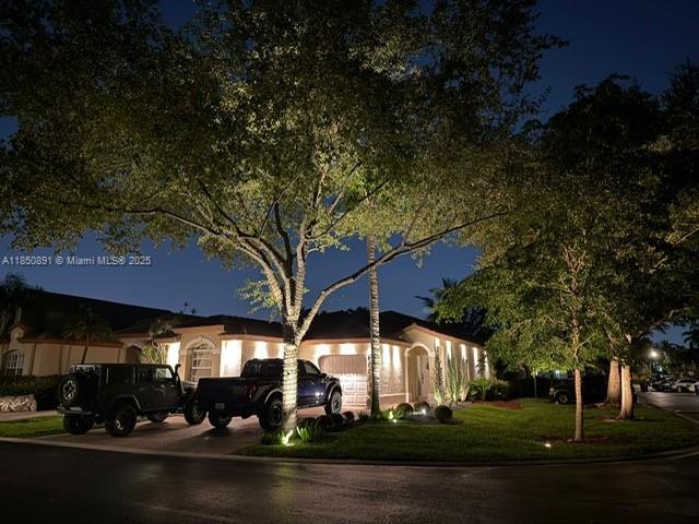 Impeccably remodeled 3 bed 2 bath corner home in gated Doral community. Stunning master suite with walk-in closet and must see bathroom. Elegant finishes, lush landscaping, and custom lighting throughout. Spacious backyard is fully finished for entertaining. One-car garage plus 3-car driveway. Enjoy access to community pool and playground. Prime location near top schools and shops. Call Romina Filipponi at 786.277.1088 for showings.