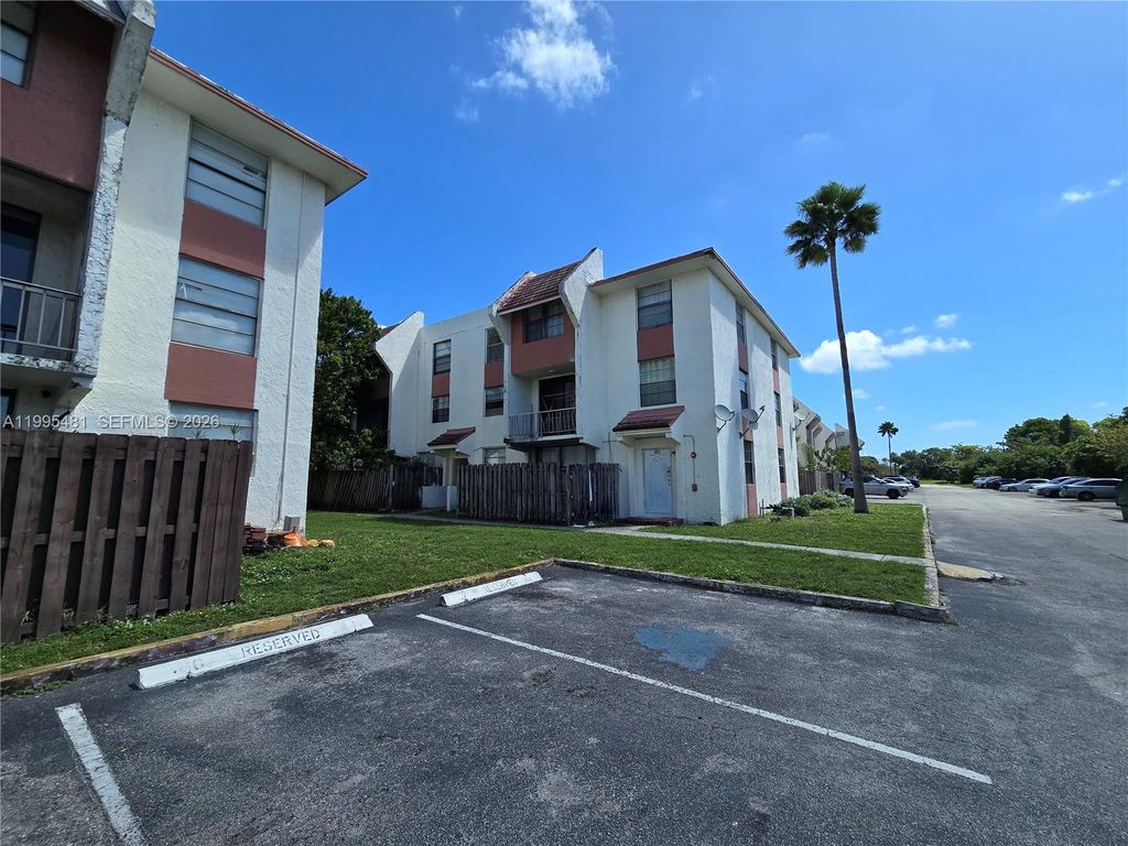 Photo of 1750 NW 55th Ave #103, Lauderhill, FL 33313 (MLS # A11995481)