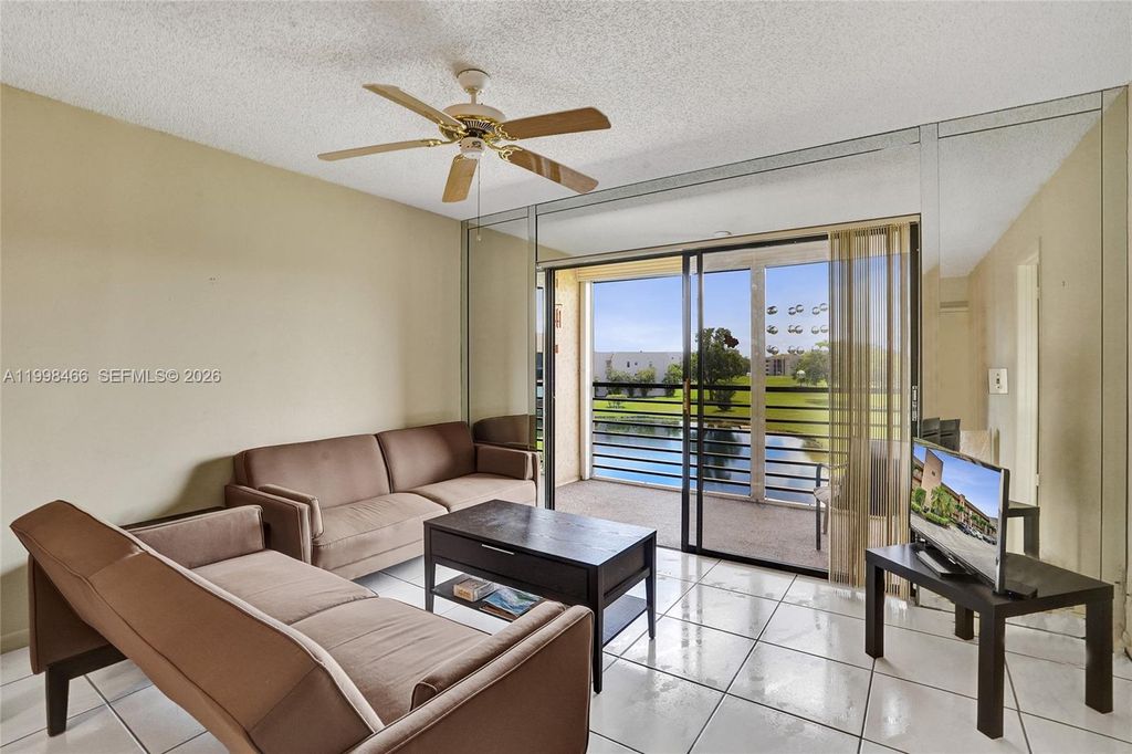 Photo of 10100 NW 30th Ct #310, Sunrise, FL 33322 (MLS # A11998466)