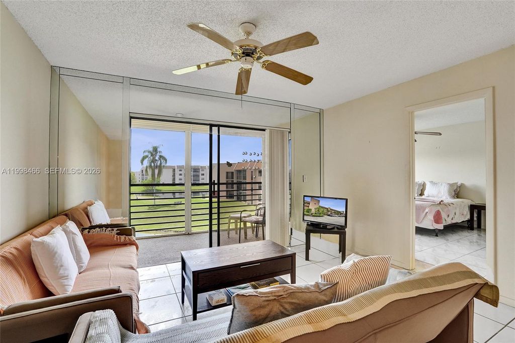 Photo of 10100 NW 30th Ct #310, Sunrise, FL 33322 (MLS # A11998466)