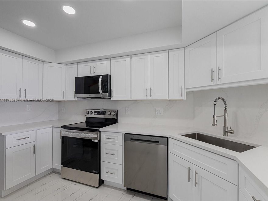 THIS IS A MUST SEE CONDO! Stunningly remodeled condo located in Lands of the President. This beautiful condo has been recently updated with all new white cabinetry throughout the unit. Matching in the kitchen, baths, with gorgeous white granite countertops, amazing new tile flooring, new stainless steel appliances, new lighting fixtures, new baseboard molding, new doors, new recessed lighting, along with fully renovated bathrooms. The building has Concierge service, a full list of amenities