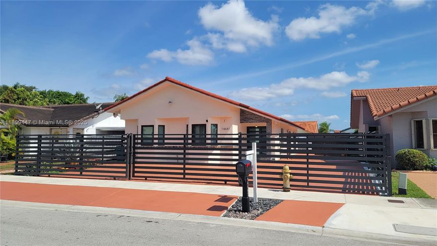 Presented by Luxury Real Estate Group, this beautifully remodeled single-story home combines modern elegance and comfort. Enjoy a spacious backyard with a heated above-ground pool, perfect for both relaxation and entertaining. Filled with natural light, the home is ideally located near highways, shopping, top-rated schools, and entertainment. The contemporary kitchen features sleek granite countertops, stainless steel appliances, and impact windows. Modern porcelain flooring flows throughout the home, enhancing its sophistication. The master suite offers a walk-in closet and a luxurious jacuzzi. With a four-car driveway and no HOA, this home provides convenience and flexibility. Don't miss out on this exceptional opportunity!