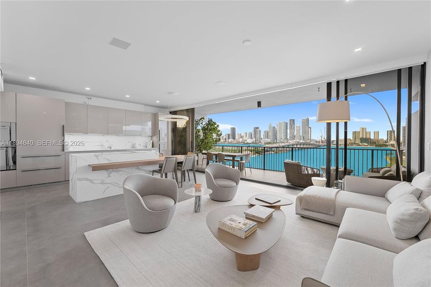 Experience refined island living in this newly renovated and reconfigured two-story townhome on the Venetian Islands. Featuring 1 bed plus flex space for an office or guest room and 2 full baths, this home showcases floor-to-ceiling retractable balcony doors in both the living area & bedroom, seamlessly blending indoor and outdoor spaces and framing breathtaking Miami skyline views. Elegant finishes, premium appliances, and custom built-ins complete the sophisticated interior.  1000 Venetian offers full-service amenities including 2 pools, fitness center, tennis courts, barbecues, dog park and 24-hour security.