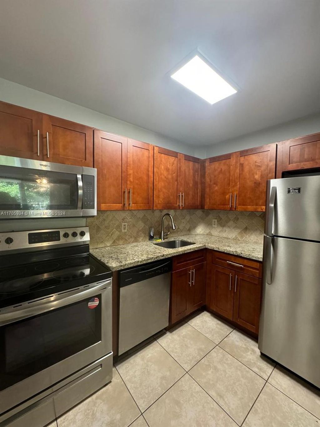 Photo of 10709 Cleary Blvd #210, Plantation, FL 33324 (MLS # A11705934)