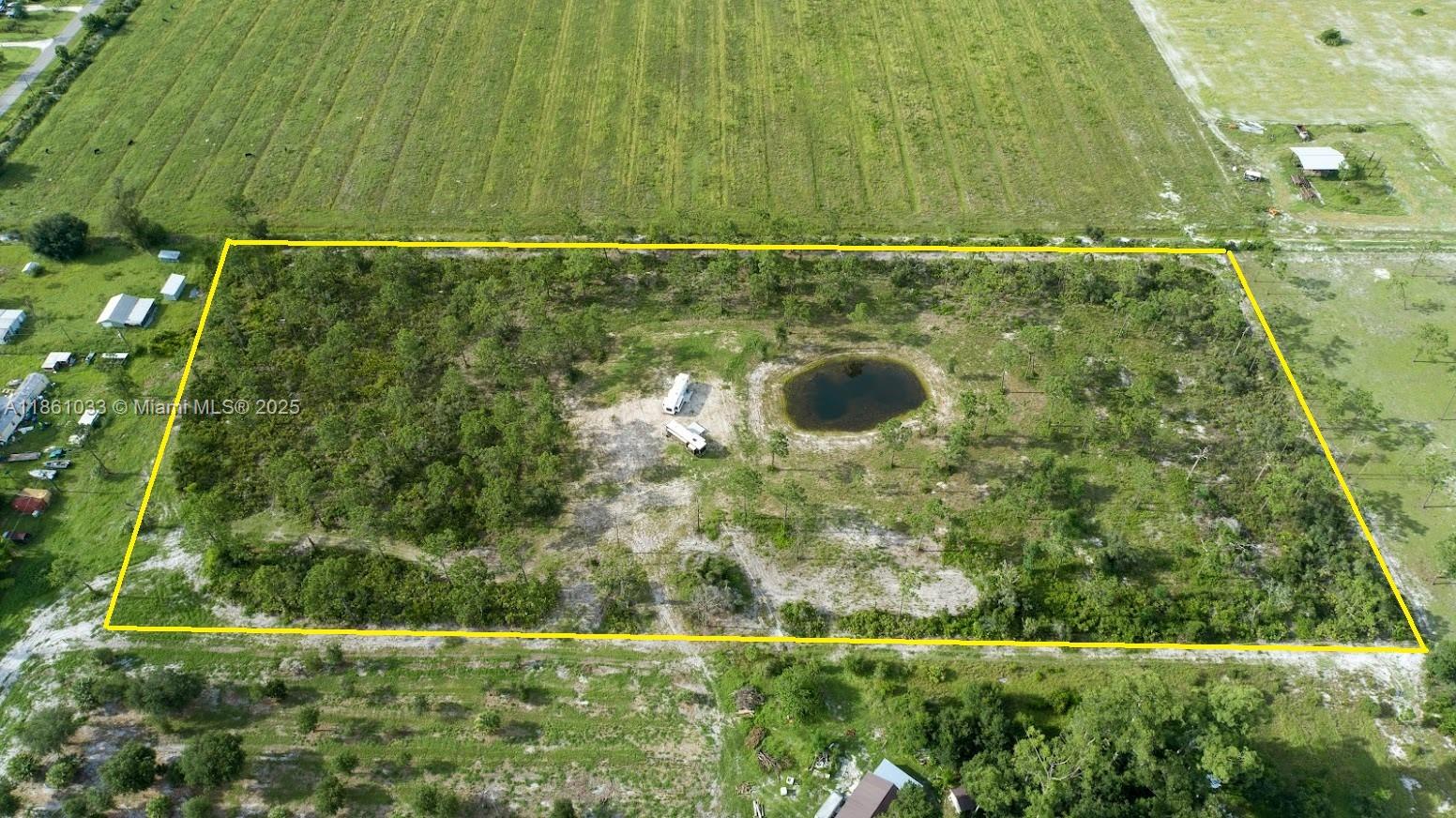 10± mostly secluded acres in the peaceful Muse Community! This prime country location features a pond, a cleared homesite with a built-up pad, and the majority of the land already cleared for easy development. Zoned Agriculture/Residential, the property offers endless possibilities — bring your horses, livestock, and country living dreams! Located in the highly sought-after “A” rated West Glades School District. (There are 2 RV's on the property that the owner will sell separately)