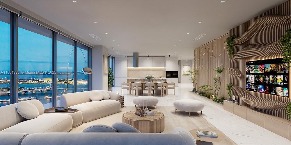 Every detail of Unit 4007 at Aria Reserve has been meticulously curated to capture the essence of sophisticated Miami living. From the moment you enter, floor-to-ceiling impact glass walls fill the residence with abundant natural light while framing uninterrupted, panoramic views of the Bay, the Atlantic Ocean, and the iconic Miami skyline. The home offers 4 spacious bedrooms and a private office, thoughtfully designed to provide ultimate flexibility for family living, professional work, or hosting elegant gatherings. Every space blends luxury, comfort, and modern functionality, creating an environment where indoor elegance meets outdoor beauty. This residence is a sanctuary above the city, perfectly positioned to enjoy the vibrant energy of Miami and the serenity of its waterfront views