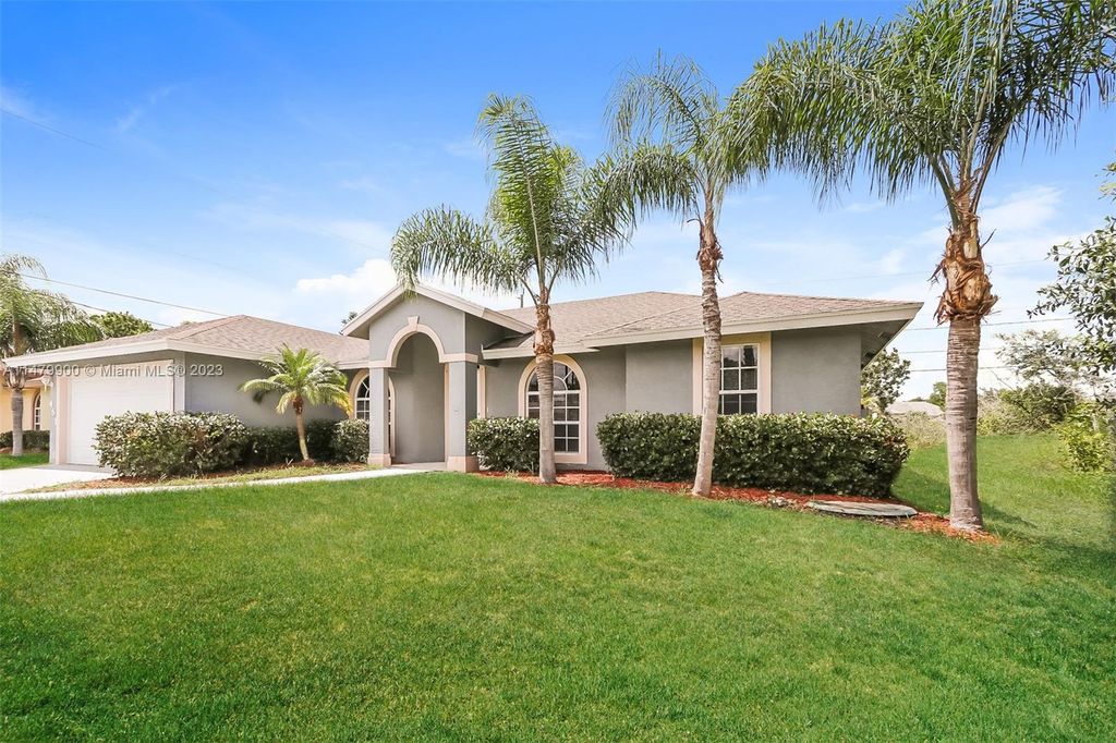 Photo of 451 SW Paar Dr, Port Saint Lucie, FL 34953 (MLS # A11479900)