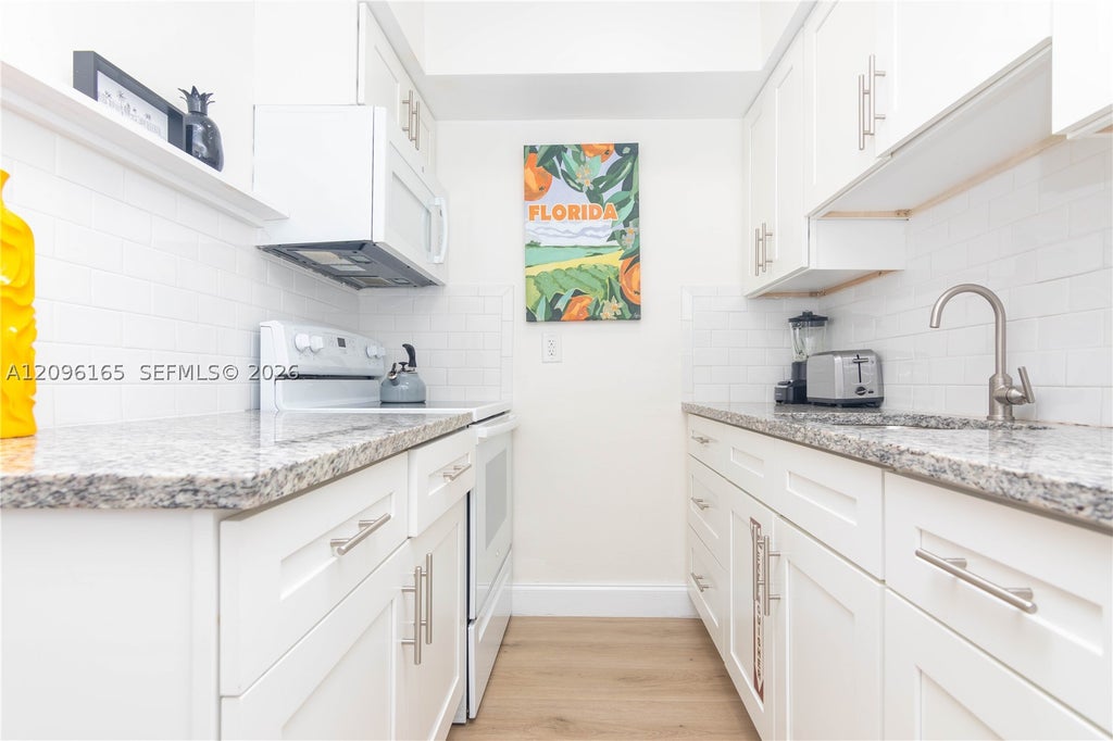 Photo of 735 NE 15th St #1-4, Fort Lauderdale, FL 33304 (MLS # A12096165)