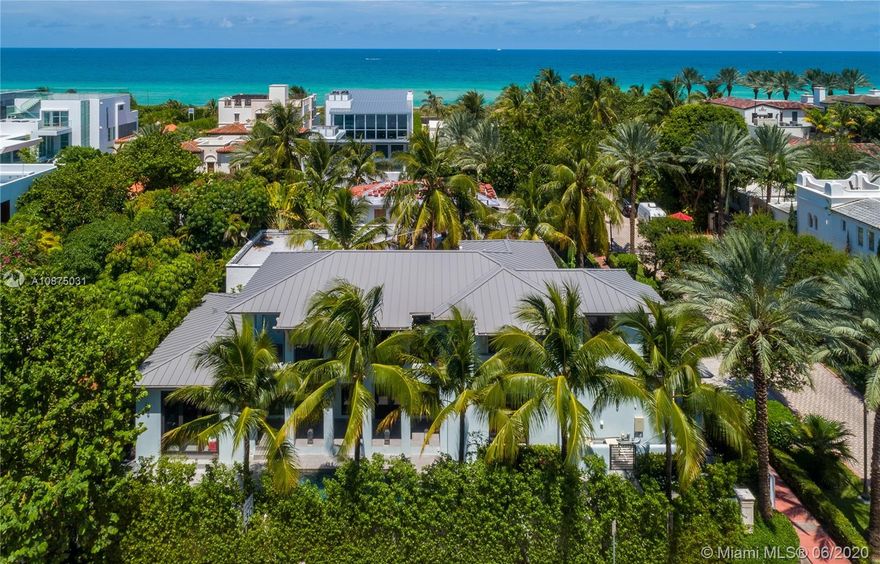 Stunning new construction smart home situated in the beach side Altos Del Mar community, steps from the ocean. 4Bed, 4.5Bath home includes Creola marble & wide plank oak floors, hurricane impact windows & custom cabinetry throughout. Enter the light-filled main kitchen complete w Calacatta gold & quartz counters, 2 Sub Zero refrigerators, mahogany temp controlled wine closet, 2 Wolf ovens, & 6 burner cooktop. Sit by the sparkling saline pool in the air-conditioned summer kitchen enclosed w Korus bi-fold doors, w built-in Lynx grill, & Dacor wine station. Enjoy the spacious master suite w private balcony, two walk-in closets, Calacatta gold steam shower & double vanity w large soaking tub & Toto toilet. Air-conditioned 2-car garage, Generac generator, East & West porches.