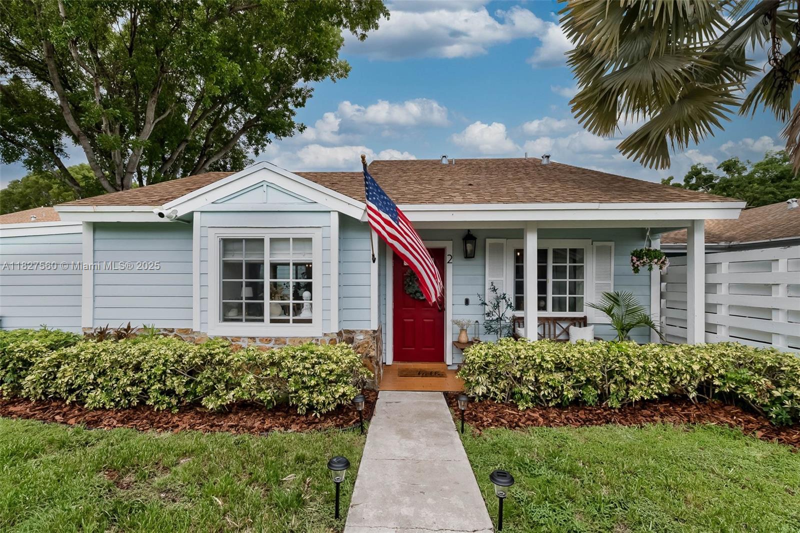 Charming 2-bedroom,1-bath single story, ground floor condo in the beloved community of Country Walk. Beautifully remodeled kitchen with white cabinetry, granite countertops, farmhouse sink and eat in snack bar opens to living area with vaulted ceiling, sliding glass doors out to the fenced patio with shed for storage and access to the utility room. Wood-plank tile flooring throughout. Impact windows & doors. Two generously sized bedrooms and remodeled bath just down the hall. 2 assigned parking spaces plus visitor parking. A fantastic community atmosphere with seasonal activities and wonderful amenities that include pool, clubhouse, basketball and tennis courts and playground.