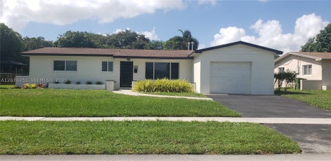Photo of 8320 NW 24th Ct, Pembroke Pines, FL 33024 (MLS # A12076351)