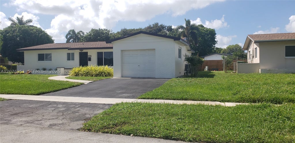 Photo of 8320 NW 24th Ct, Pembroke Pines, FL 33024 (MLS # A12076351)