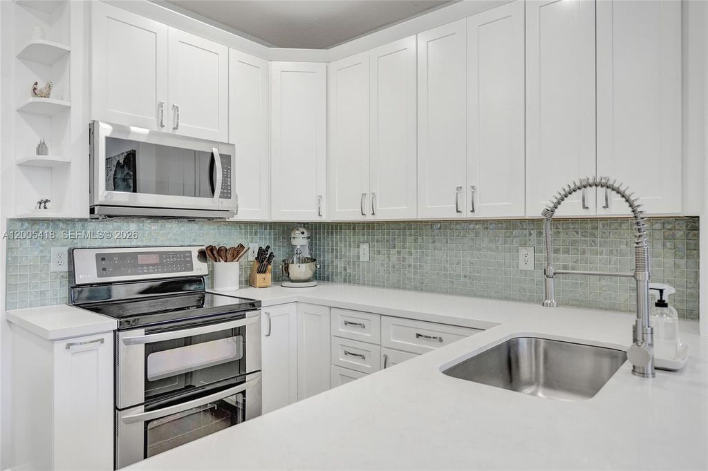 Photo of 1062 SW 158th Ave, Pembroke Pines, FL 33027 (MLS # A12005418)