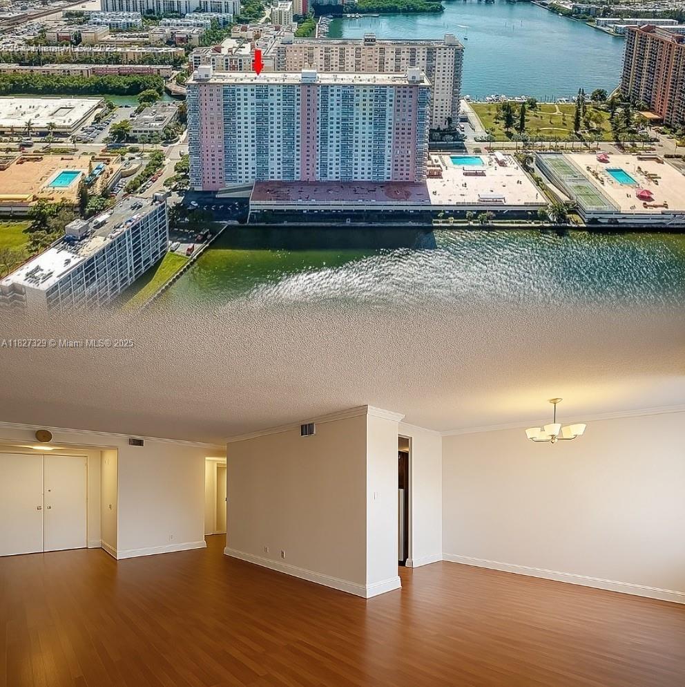 Spacious 1 bedroom with 1.5 bath in prestigious Sunny Isles beach. City views. First floor. Laminate wood floors through-out. Building offers many amenities: Doorman, renovated pool, gym, gameroom, conference room, sauna. Covered parking Walking distance to the Ocean. Competitively priced to make your own. Low maintenance fees.