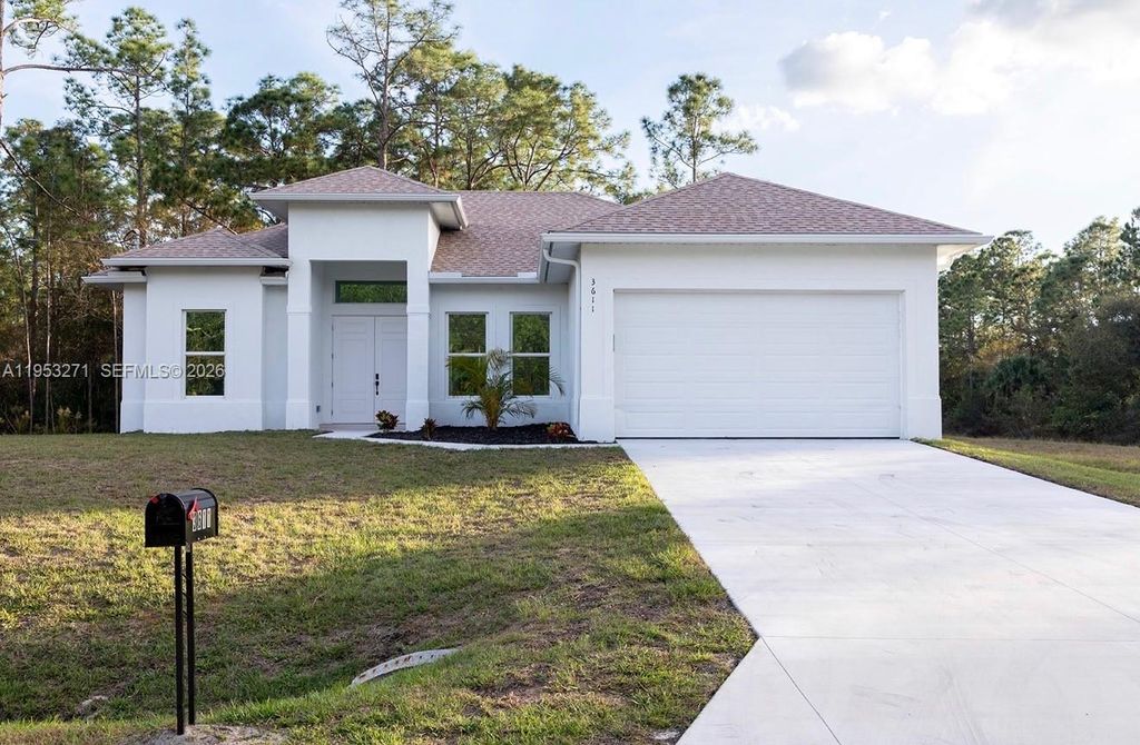 Photo of 3612 56th St W, Lehigh Acres, FL 33971 (MLS # A11953271)