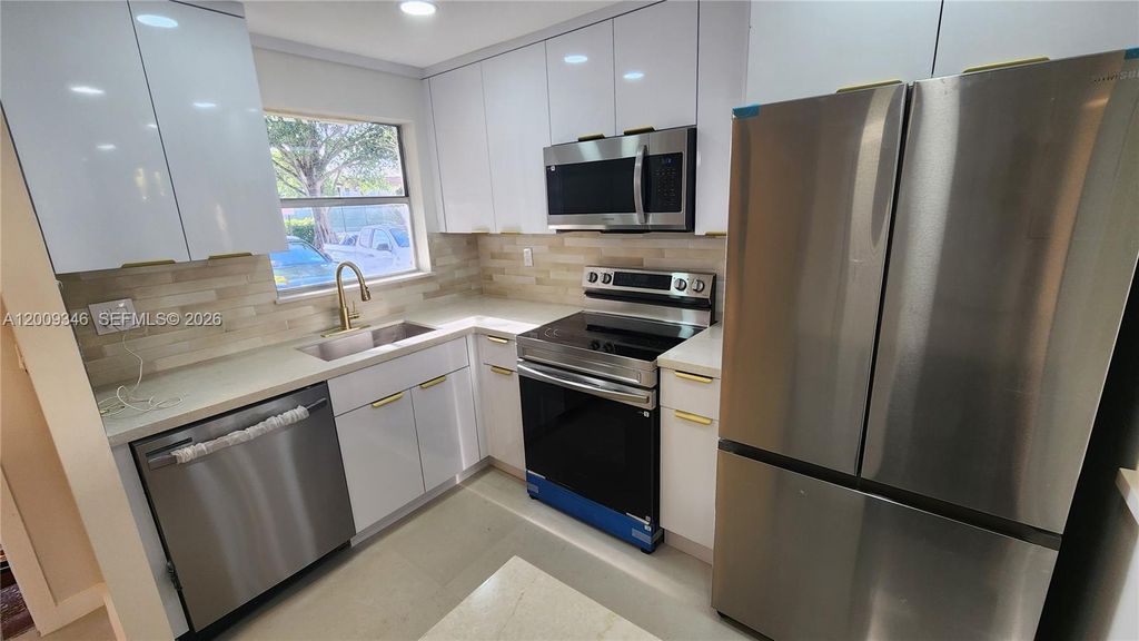 Photo of 2711 N Pine Island Rd #112, Sunrise, FL 33322 (MLS # A12009346)