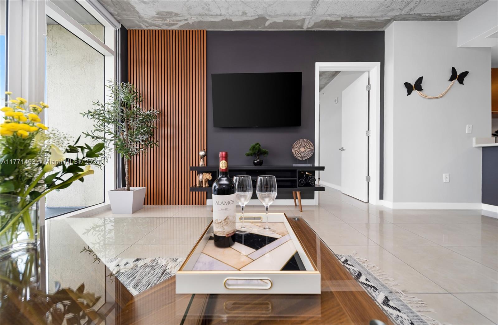 Ready, set, invest! Experience luxury and convenience in this absolutely stunning corner unit apartment with spacious bedrooms, custom closets, updated kitchen and bathrooms and brand-new washer and dryer. Furniture was elegantly procured for the space (unfurnished option available). Perfectly situated in the heart of Midtown Miami, you're just steps away from Design District, Edgewater and Wynwood. In addition to restaurants, bars, coffee shops and stores including Target, Trader Joes and Starbucks at your door step! The best part is this building; which allows for daily rentals/AIRB&B, has state of-the-art amenities, including a pool, gym, yoga room, business center, golf practice, barbecue area, and 24-hour lobby service. One garage parking spot included. Pet friendly building.