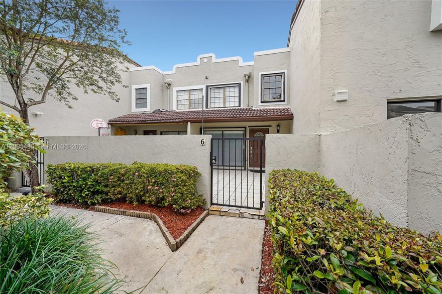 Impeccably renovated townhome in Palm Point at the Hammocks featuring 2 bedrooms and 2.5 bathrooms. This move-in ready residence offers a beautifully remodeled interior with tile wood-style flooring, a newer A/C system, stainless steel appliances, granite countertops, and in-unit washer and dryer. Enjoy two private patios, perfect for relaxing or entertaining.

One of the standout features is the premium parking space, the very first parking spot with direct access to the townhouse, providing unmatched convenience for easy loading and unloading, plus additional guest parking nearby.

Located in a tranquil, well-maintained community with access to a sparkling pool and the scenic 10-mile Hammocks Trail, ideal for walking, biking, and outdoor living. Ready for immediate occupancy upon association approval. Don’t miss this exceptional opportunity!