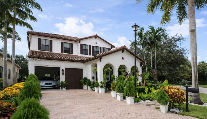 Welcome to Cooper City’s premier gated community, Monterra—renowned for its resort-style amenities and exceptional family-friendly lifestyle. This corner-lot Montecito model offers 4 bedrooms, 3 full baths, and a 2-car garage. The open-concept layout features high ceilings, porcelain white flooring, and abundant natural light. The chef’s kitchen includes a spacious island with seating for six, ideal for entertaining. The home is impeccably maintained with a fully upgraded garage. Step outside to a private backyard oasis with a heated pool and lush landscaping, offering the ultimate in privacy and outdoor living. Residents enjoy tennis and basketball courts, a state-of-the-art fitness center, parks, and serene walking trails. Located near A-rated schools, shopping, dining, and major highways.