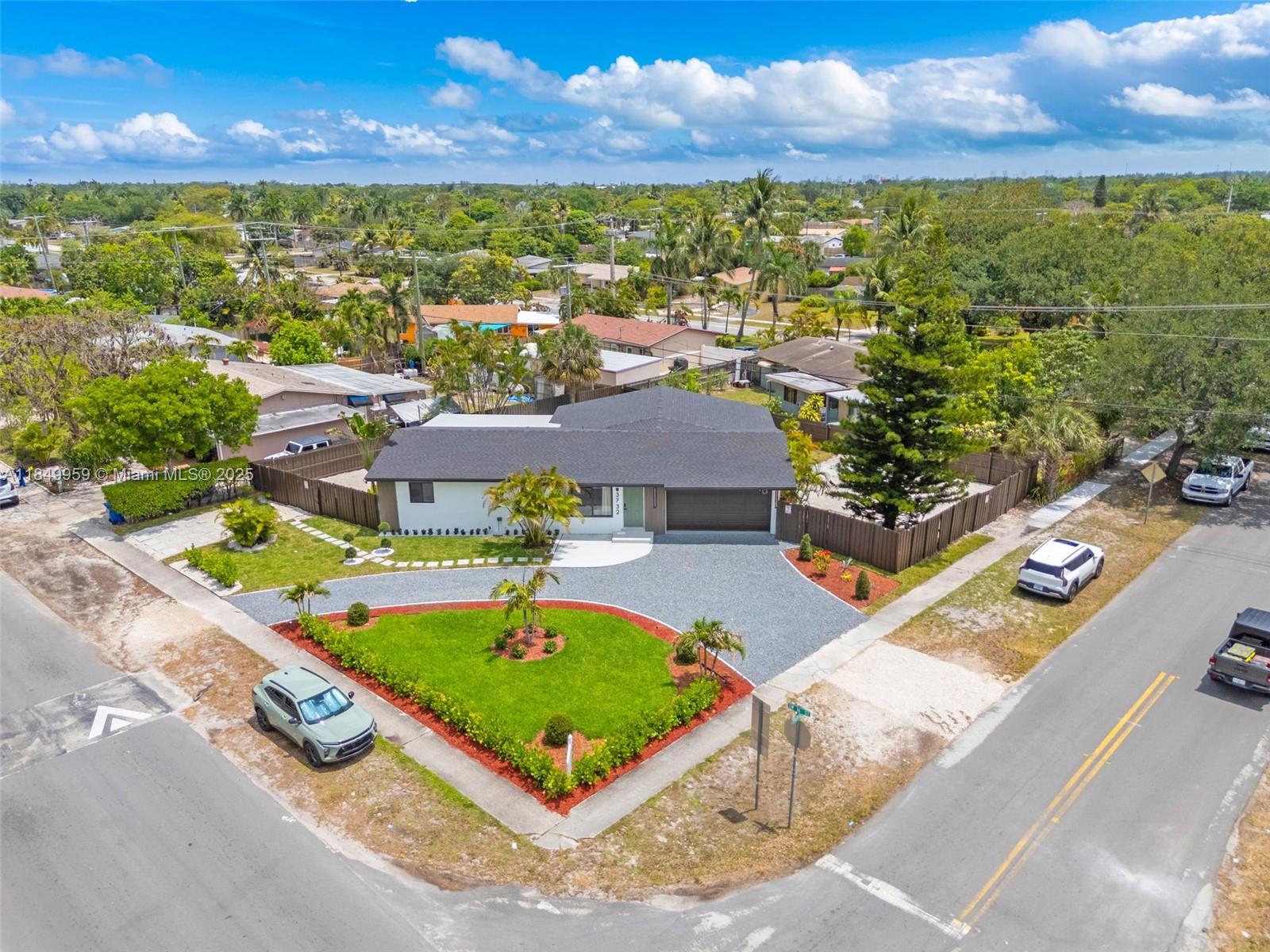 This fully upgraded 4BR/2BA single-family home features a spacious open layout, 2-car garage, modern kitchen and bathrooms, new roof (2025), impact windows and doors, and stylish flooring throughout. Enjoy a large pool, pergola for outdoor entertaining, and plenty of parking space—including room for an RV and over 8 cars in the driveway. Flooded with natural light and surrounded by upgraded landscaping front and back. Ready for immediate move-in. Easy to show