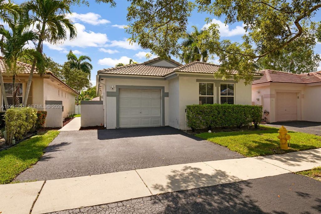 Photo of 200 NW 75th Ter, Plantation, FL 33317 (MLS # A11961321)