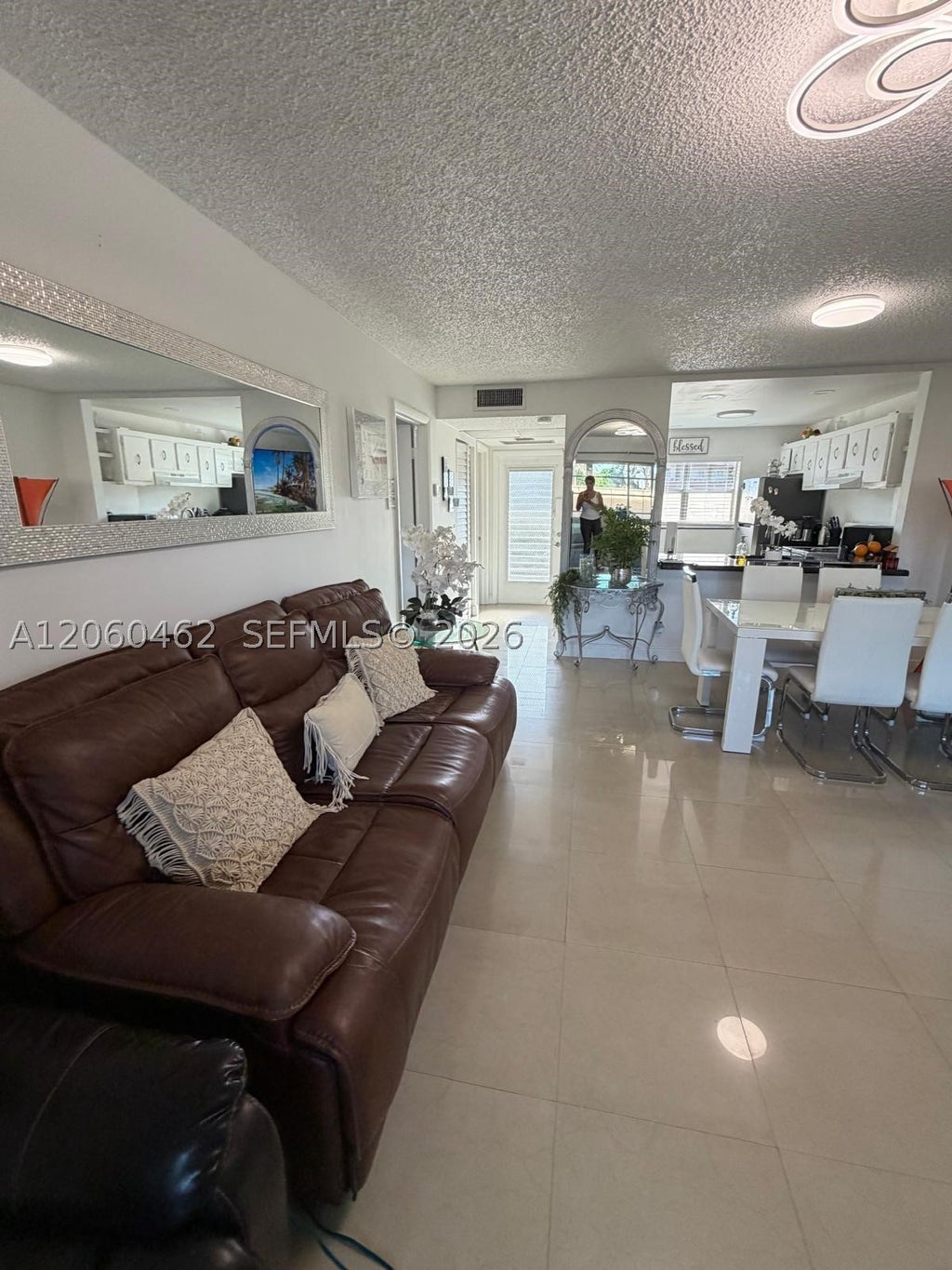 Photo of 8814 W Mcnab Rd #103, Tamarac, FL 33321 (MLS # A12060462)
