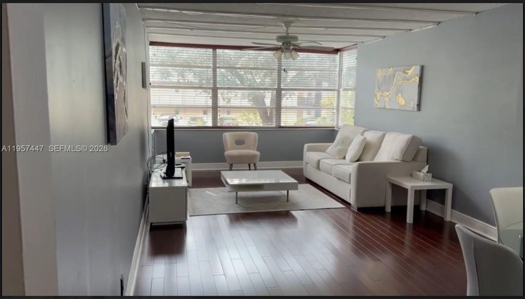 Photo of 6600 Cypress Rd #203, Plantation, FL 33317 (MLS # A11957447)