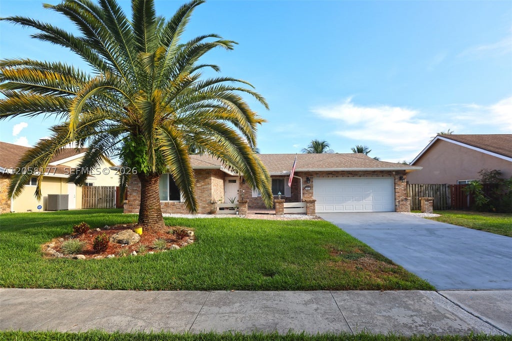 Photo of 9480 NW 10th St, Plantation, FL 33322 (MLS # A12058177)