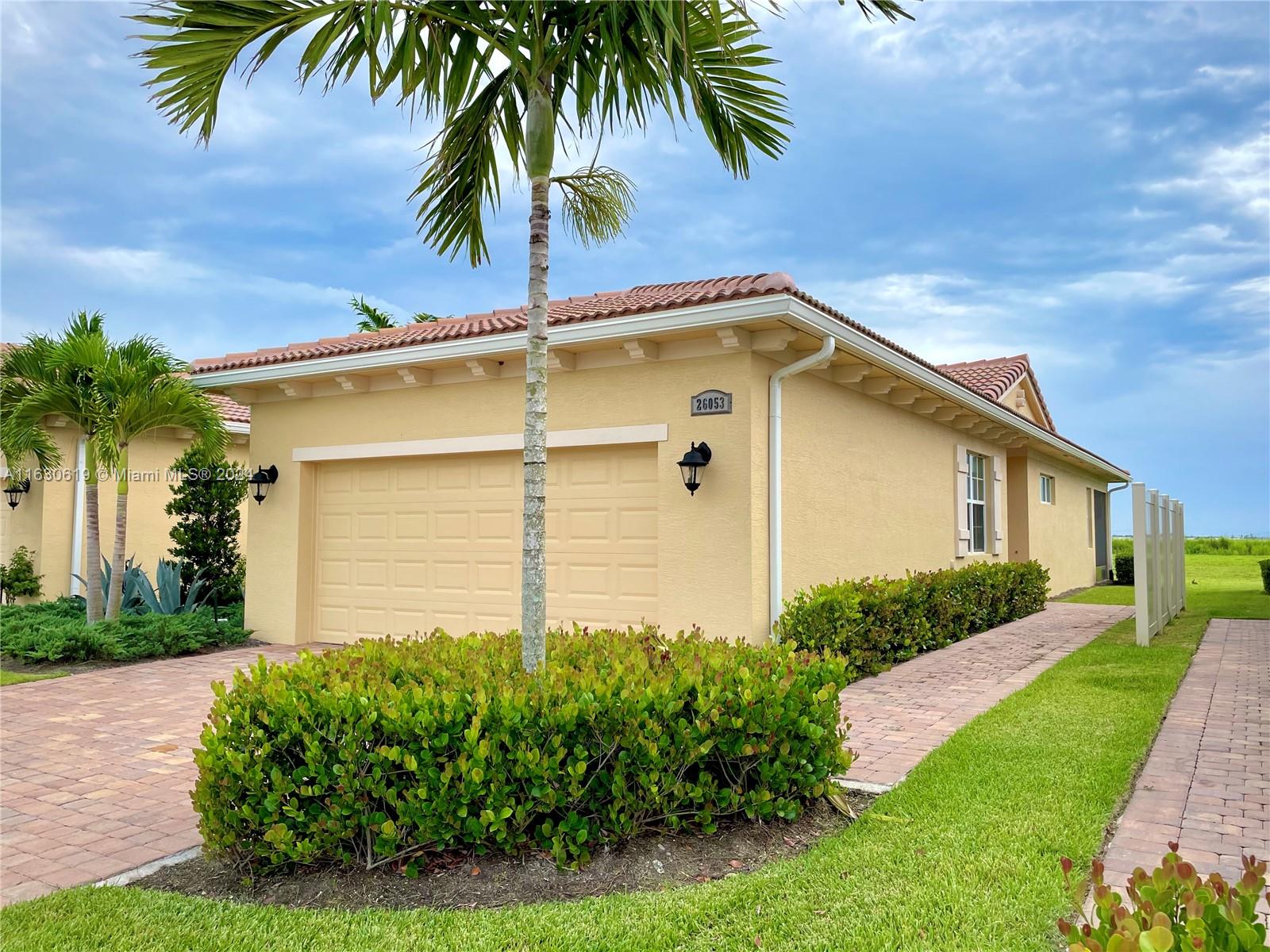 Constructed in 2022 and surrounded by three PGA award-winning golf courses, this two bedroom, two bathroom property also features a den/office that can double as a room to house guests, a tastefully-styled kitchen offering chefs and entertainers alike an oversized island with space for seating, white stone countertops, and light gray cabinets complimented by a modern tile backsplash.
This home and other residents of the Verano community also benefit from resort-style amenities that include a 24-hour gated guard house, outdoor pool, indoor lap pool, extensive fitness center, 27-court private pickleball center (the largest in South Florida!), regularly-hosted community events, and lush landscaping that extends throughout multiple parks and dog-walk areas across the development.