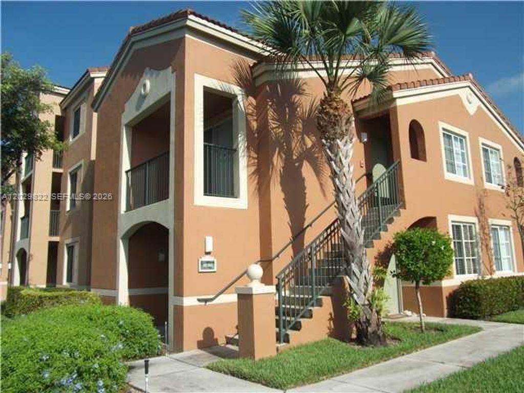 Photo of 7980 N Nob Hill Rd #207, Tamarac, FL 33321 (MLS # A12029822)
